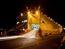 Car carrier at night